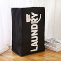 Black foldable fabric laundry hamper with carry handles