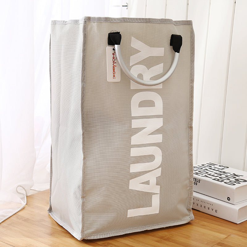 Foldable fabric laundry hamper with handles in beige