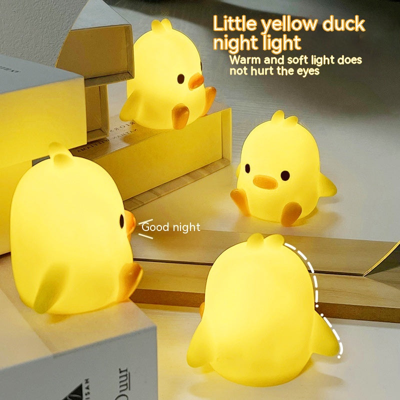 Small yellow duck night lamp with warm light

