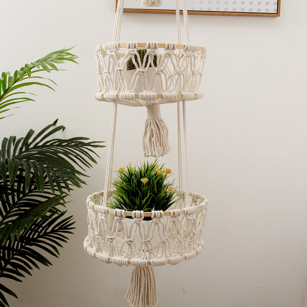 White two-tier hanging woven storage basket with plants for home organization